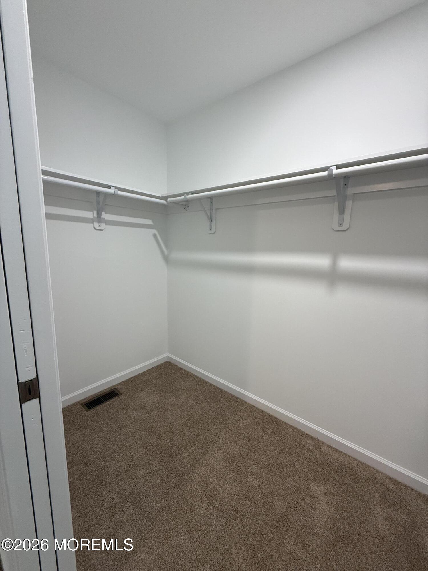 5 Canary Circle Howell, NJ 07731 - Photo 25 of 32 a view of an empty walk in closet