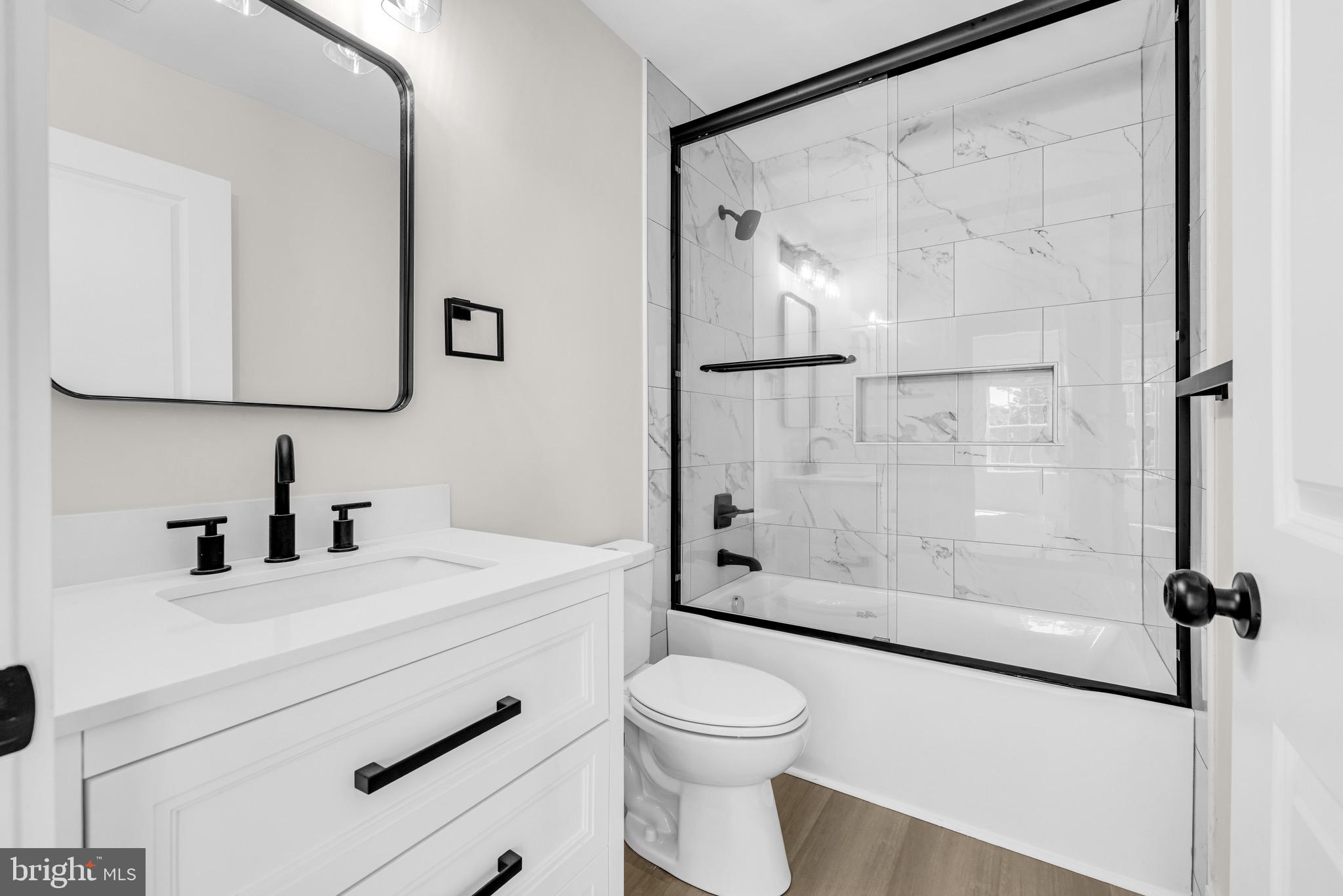 1 Sunrise Avenue Ridgely, MD 21660 - Photo 20 of 28 a bathroom with a sink toilet and shower