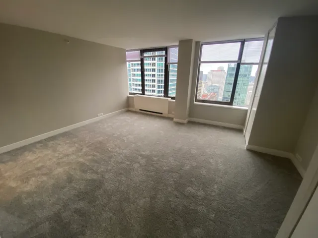 an empty room with windows