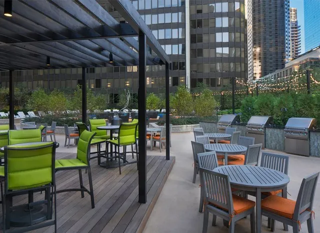 a room with gym equipment and mirror