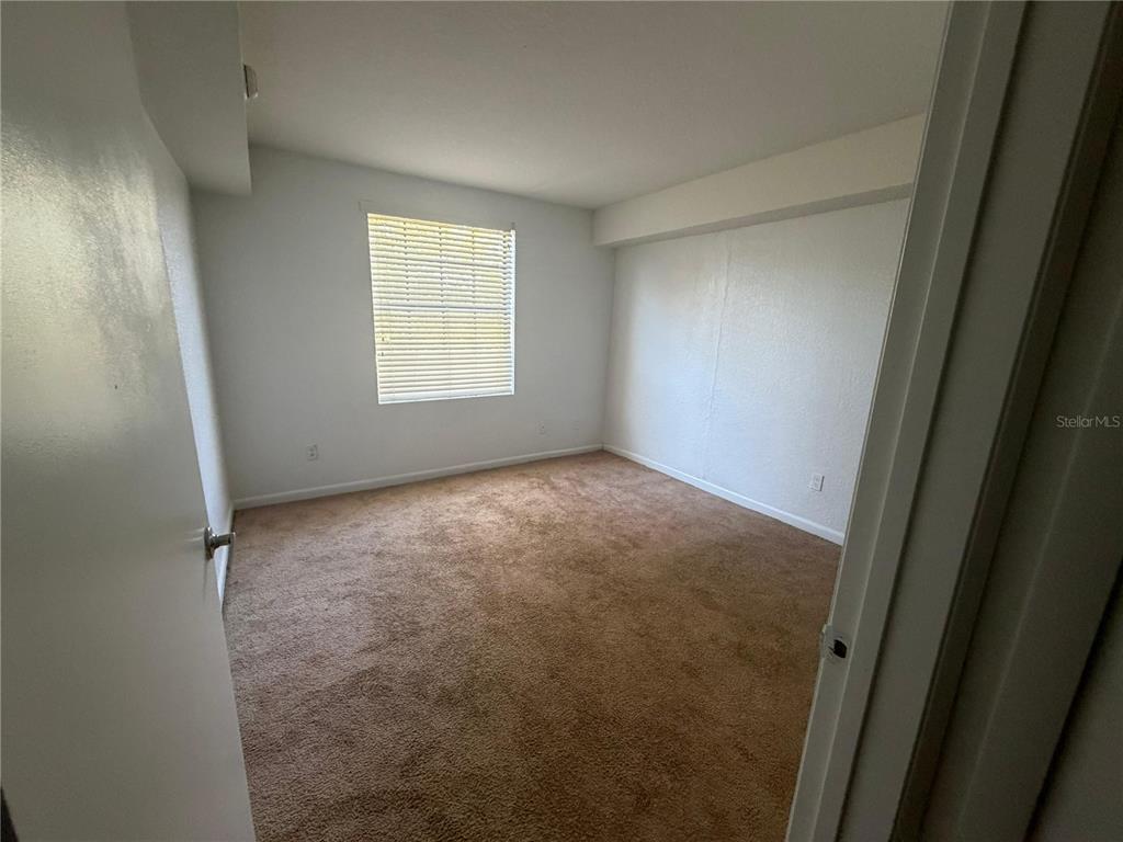 2323 McCoy Road, Unit 816 Orlando, FL 32809 - Photo 3 of 8 a view of room with window