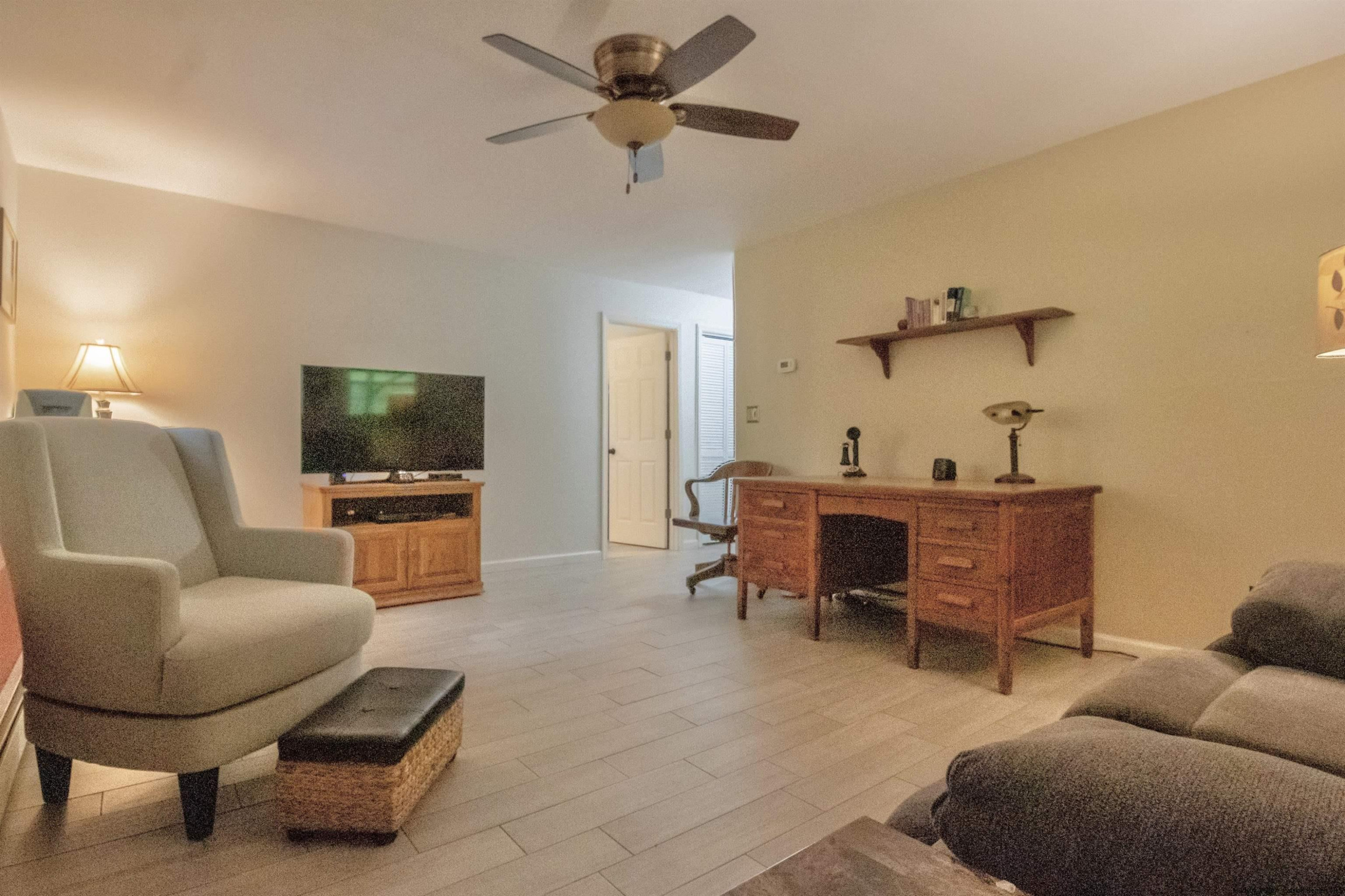 56 Alan Street Stone Ridge, NY 12484 - Photo 12 of 21 a living room with furniture and a flat screen tv
