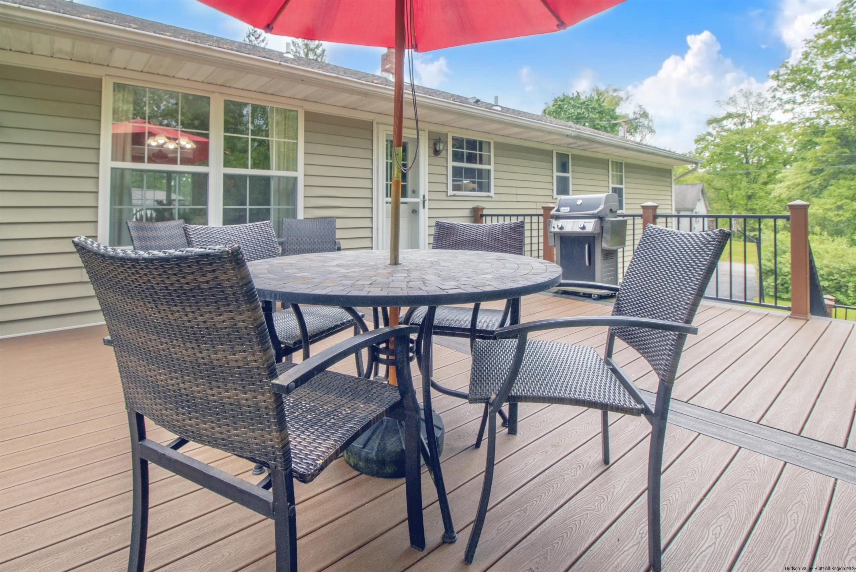 56 Alan Street Stone Ridge, NY 12484 - Photo 15 of 21 a view of a house with backyard and sitting area