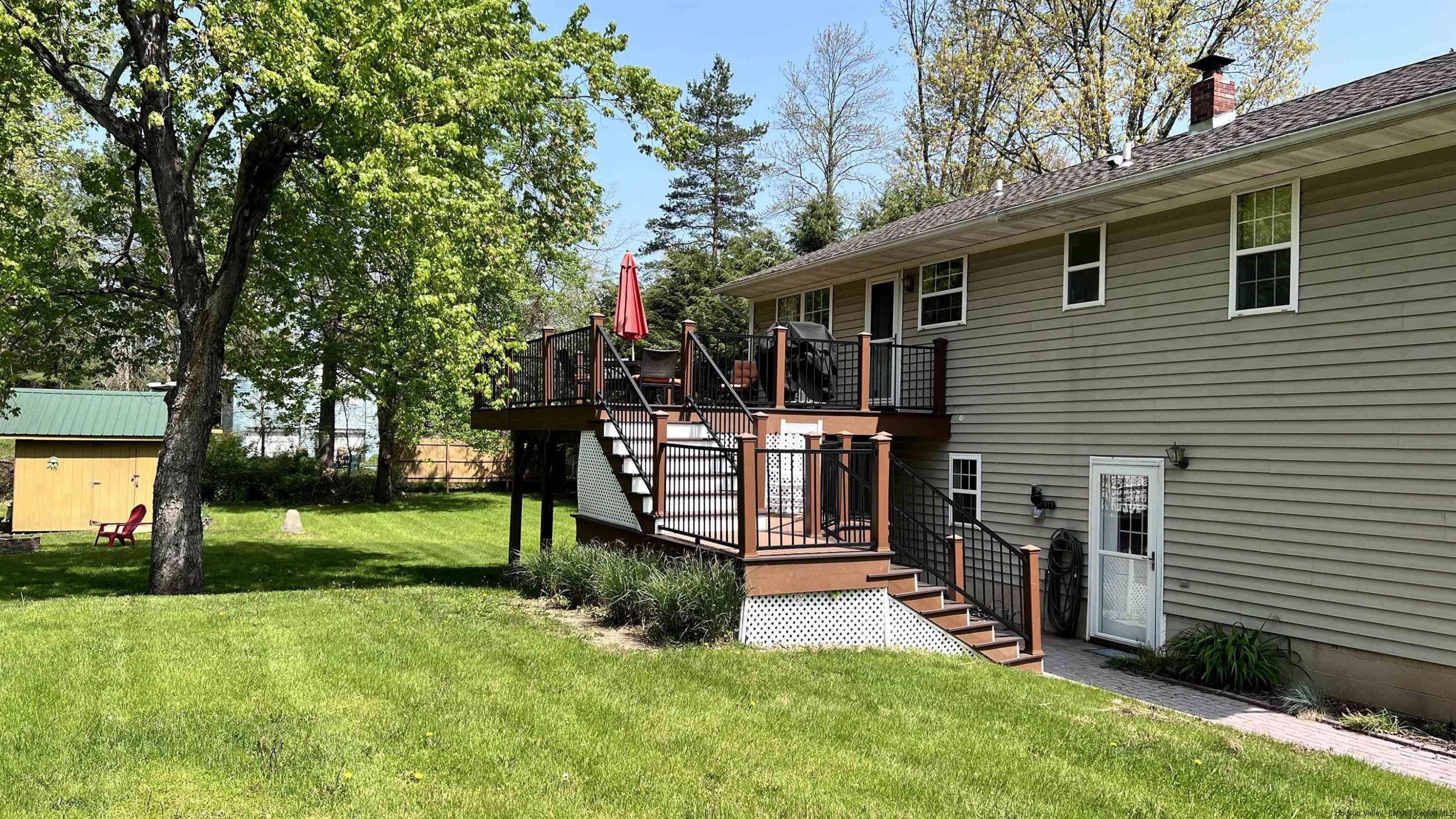56 Alan Street Stone Ridge, NY 12484 - Photo 17 of 21 a view of a house with backyard and sitting area