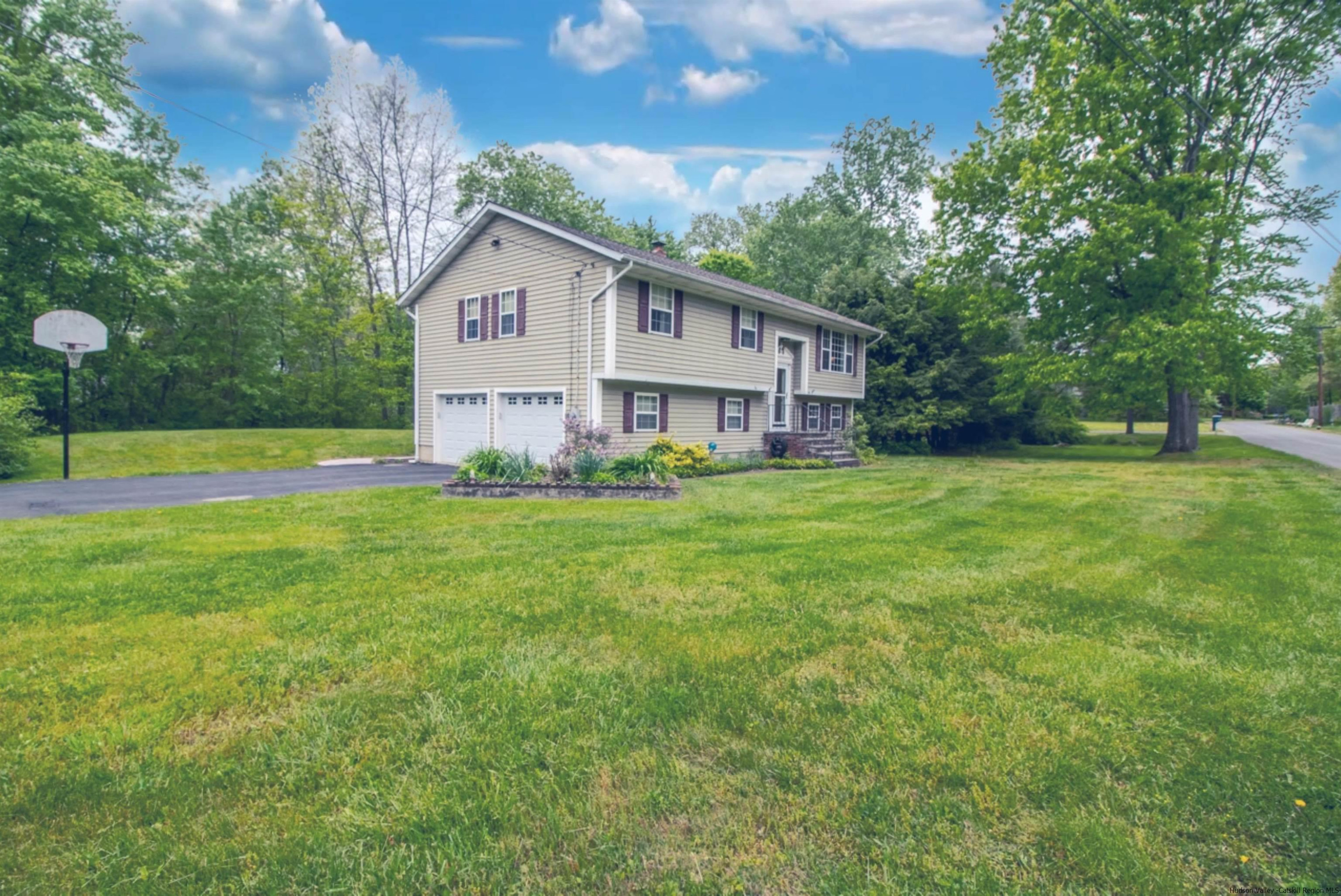 56 Alan Street Stone Ridge, NY 12484 - Photo 2 of 21 a view of a house with a big yard