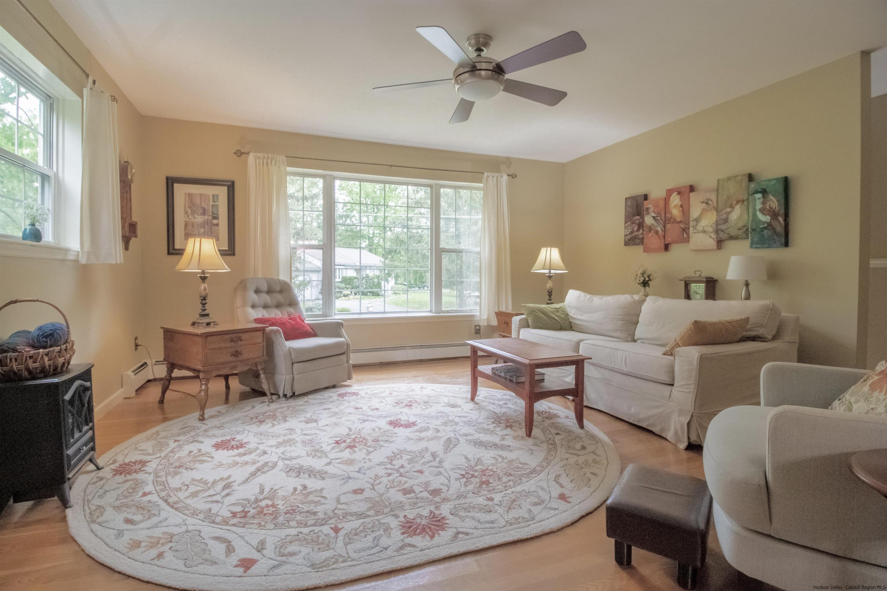 56 Alan Street Stone Ridge, NY 12484 - Photo 3 of 21 a living room with furniture and a large window