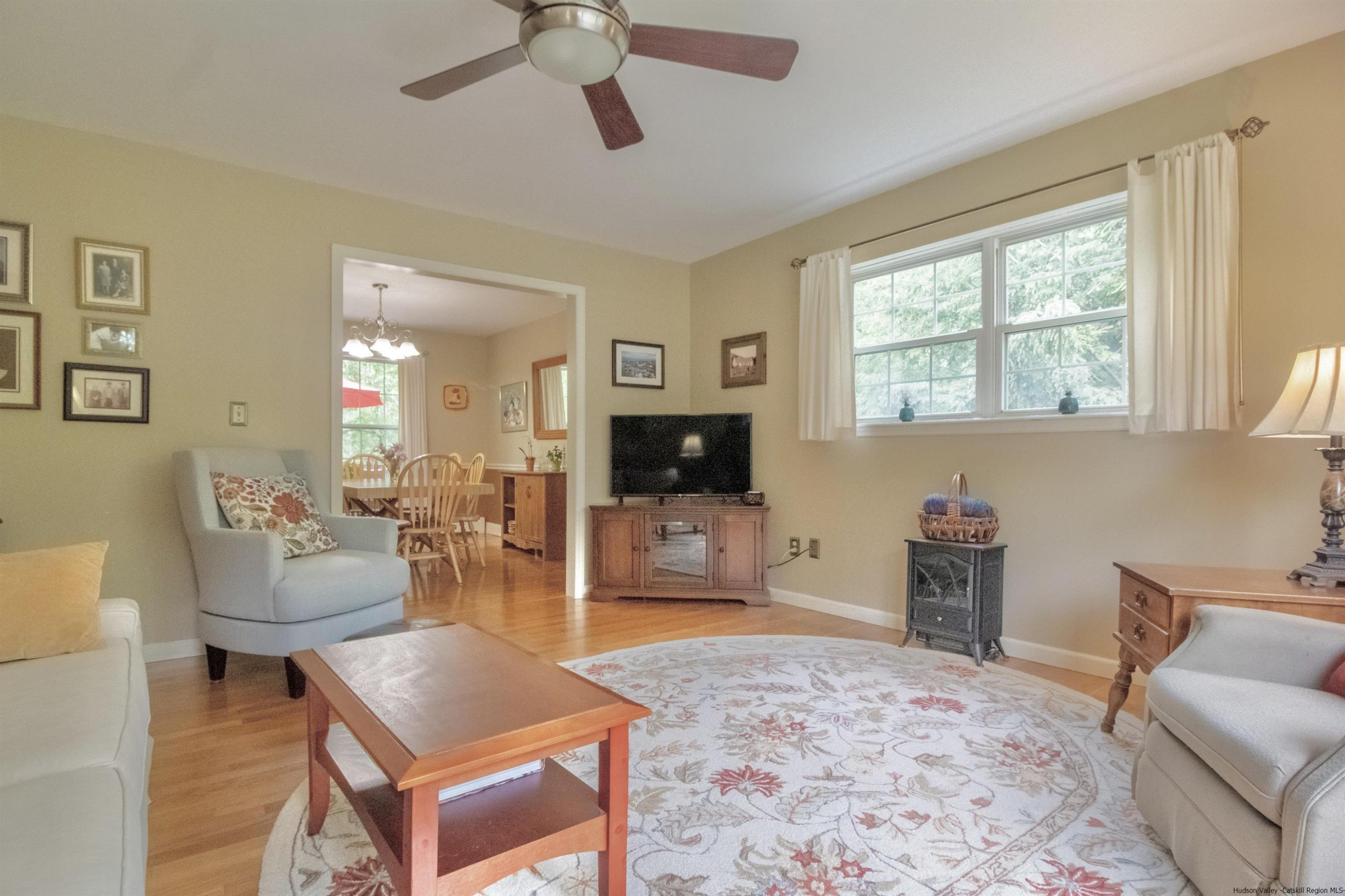 56 Alan Street Stone Ridge, NY 12484 - Photo 4 of 21 a living room with furniture and a flat screen tv