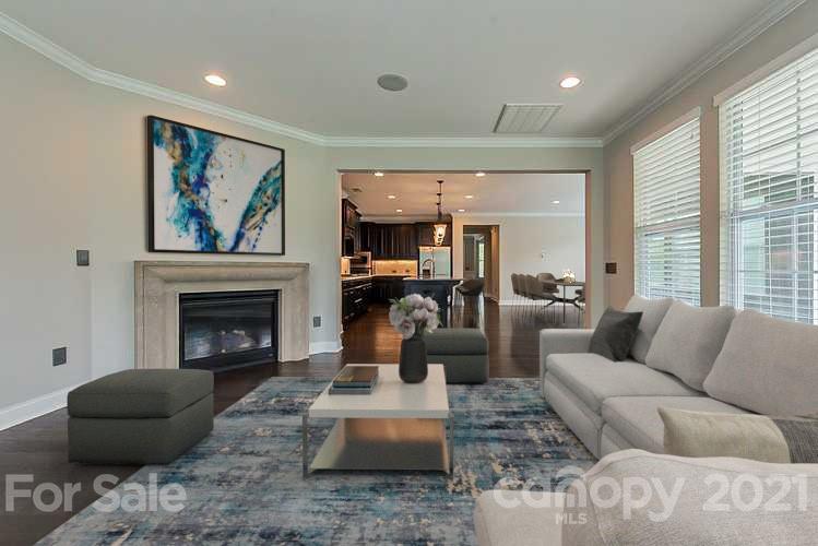 1021 Emory Lane Fort Mill, SC 29708 - Photo 2 of 24 a living room with furniture fireplace and large window
