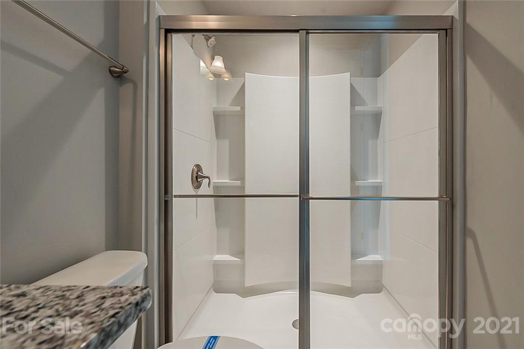 1021 Emory Lane Fort Mill, SC 29708 - Photo 17 of 24 a bathroom with a shower and a toilet sink