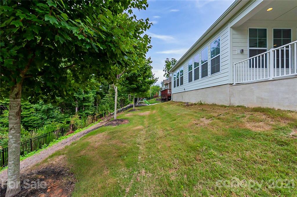 1021 Emory Lane Fort Mill, SC 29708 - Photo 22 of 24 a view of house with backyard and garden