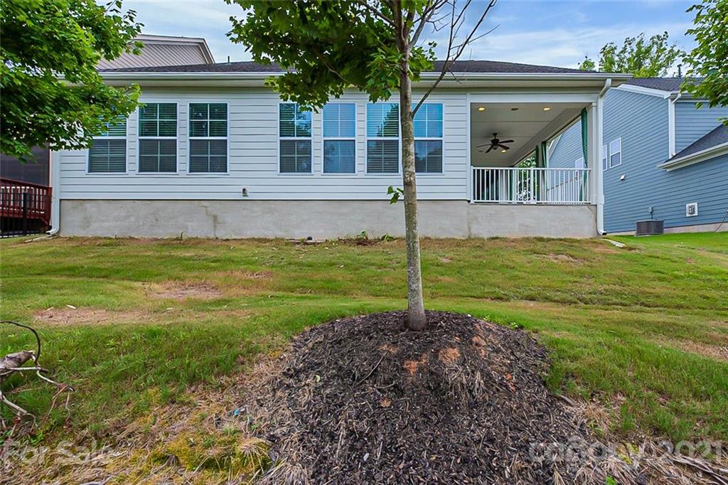 1021 Emory Lane Fort Mill, SC 29708 - Photo 7 of 24 a view of a house with backyard and a tree