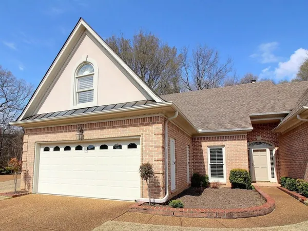 a view of a house with a garage