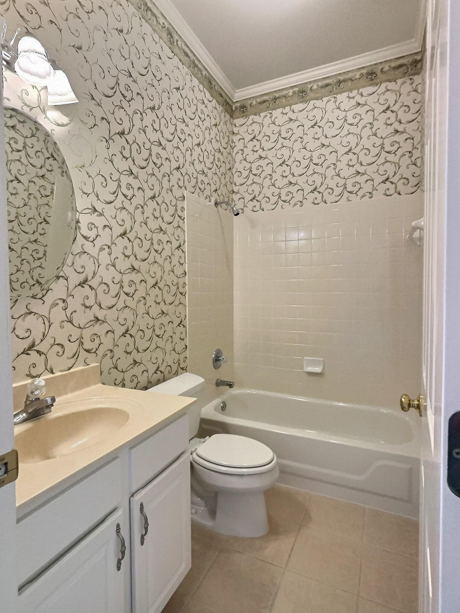 1748 Higginson Square Collierville, TN 38017 - Photo 18 of 23 a bathroom with a bathtub and sink
