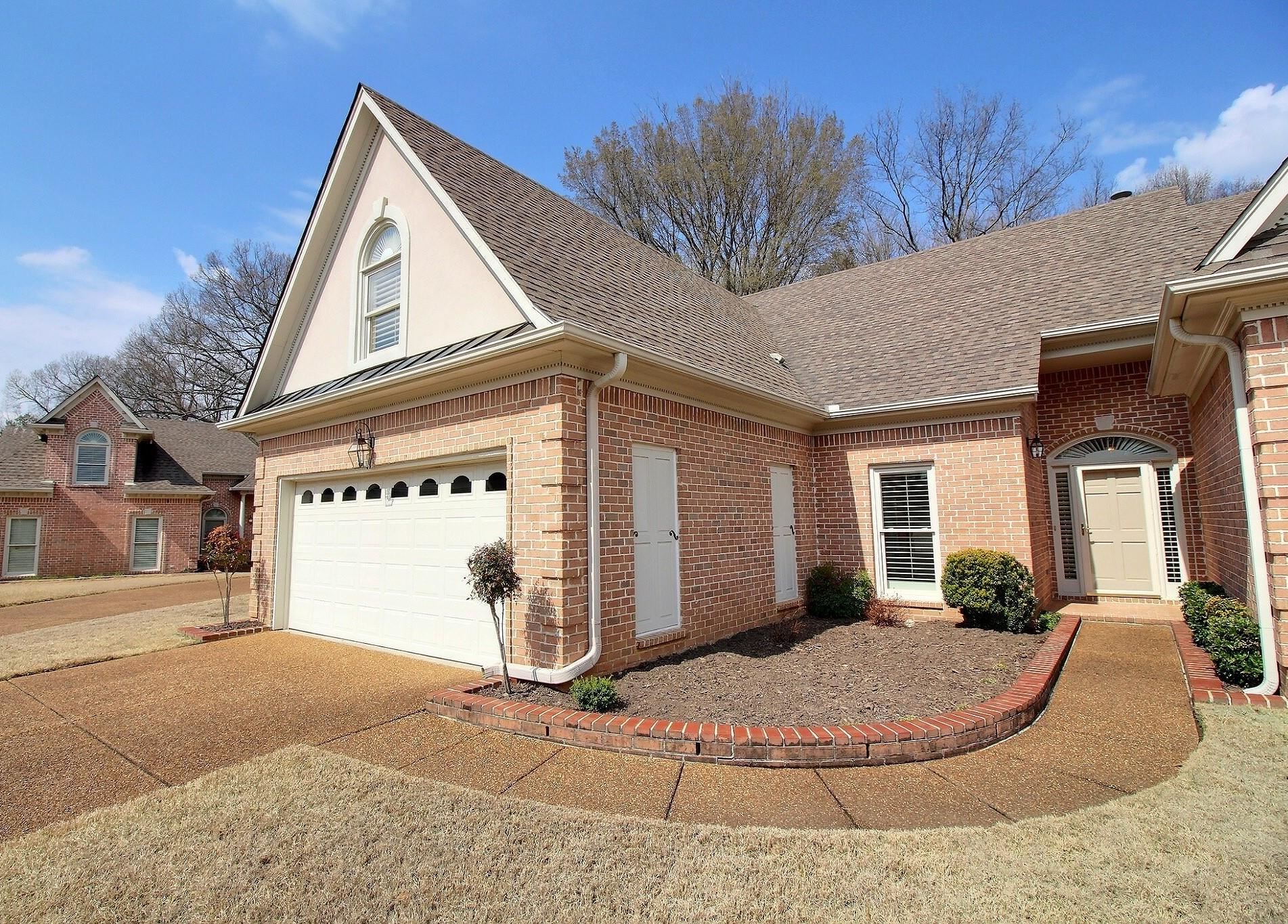 1748 Higginson Square Collierville, TN 38017 - Photo 2 of 23 a view of a house with a backyard