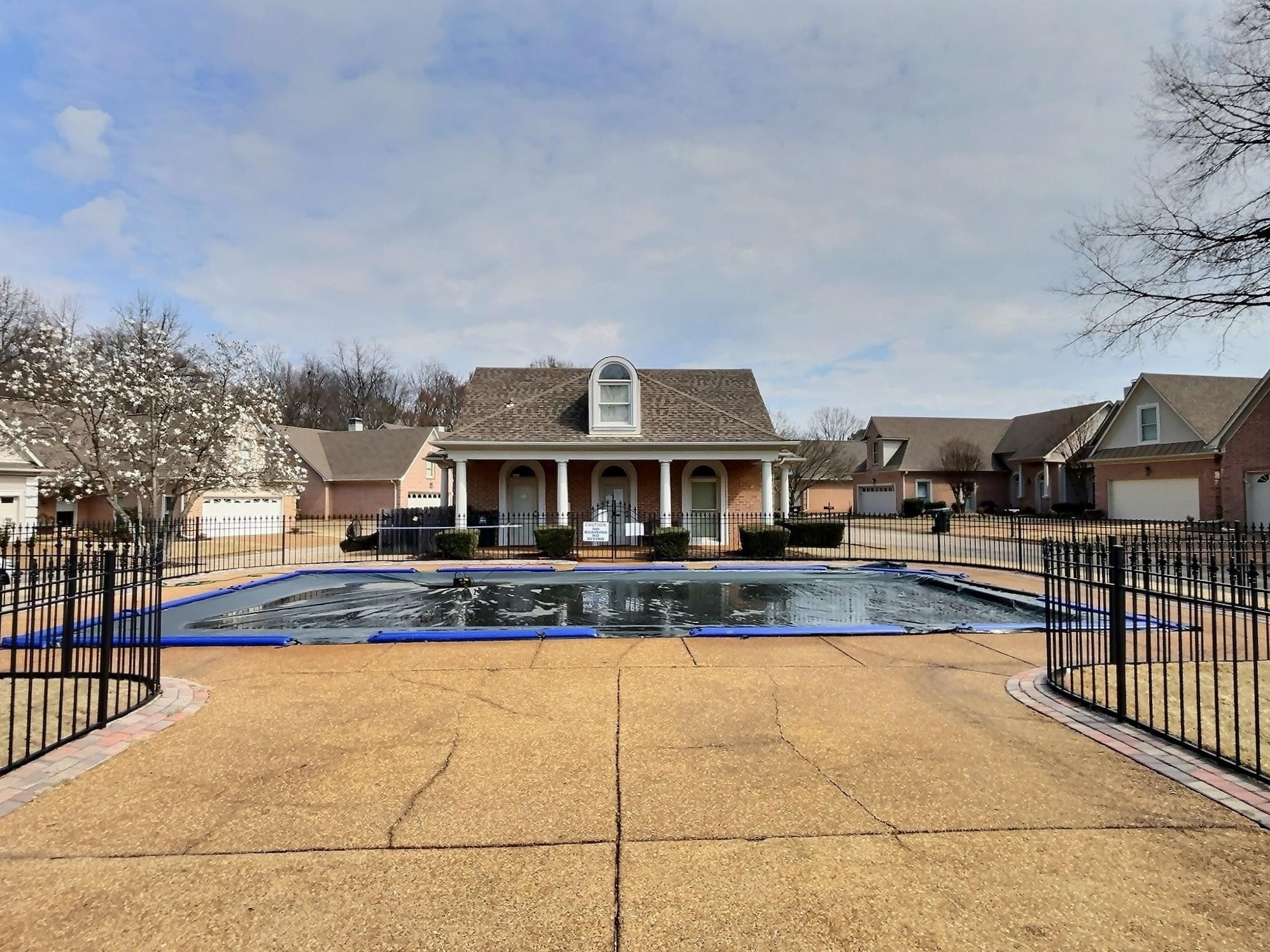 1748 Higginson Square Collierville, TN 38017 - Photo 23 of 23 a view of a house with swimming pool and sitting area