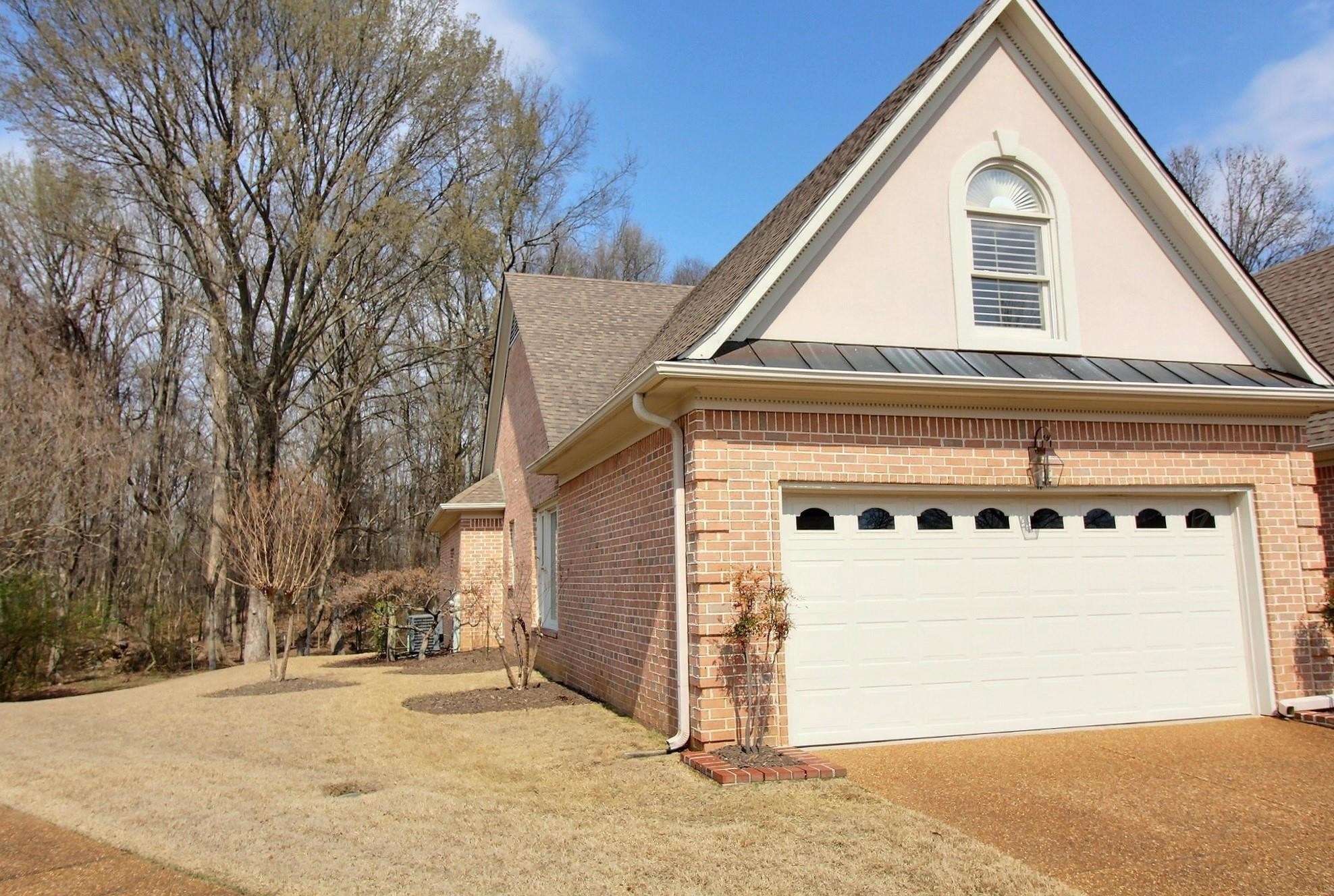 1748 Higginson Square Collierville, TN 38017 - Photo 3 of 23 a view of white house with a outdoor space