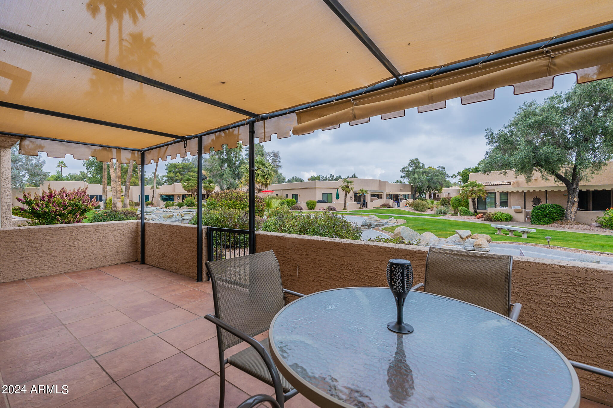 14300 West Bell Road, Unit 227 Surprise, AZ 85374 - Photo 2 of 19 Front Patio Looking out to Arapaho Pond