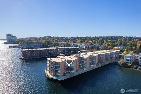 a view of a chairs with wooden floor