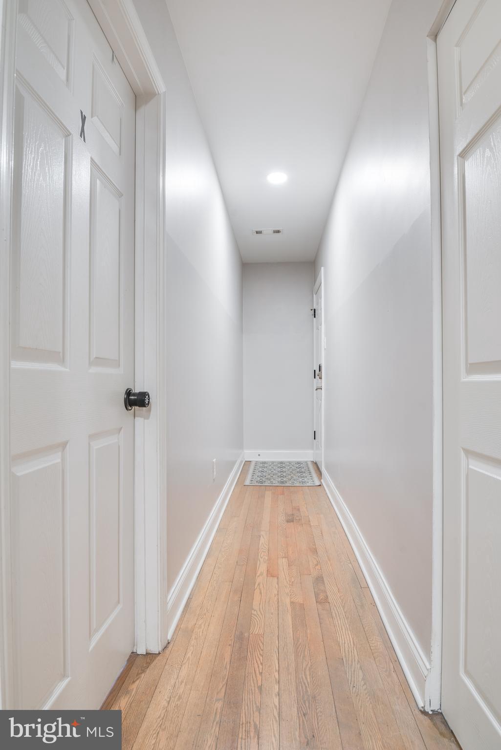 1255 Raum Street Northeast, Unit 1 Washington, DC 20002 - Photo 18 of 31 a view of hallway with stairs