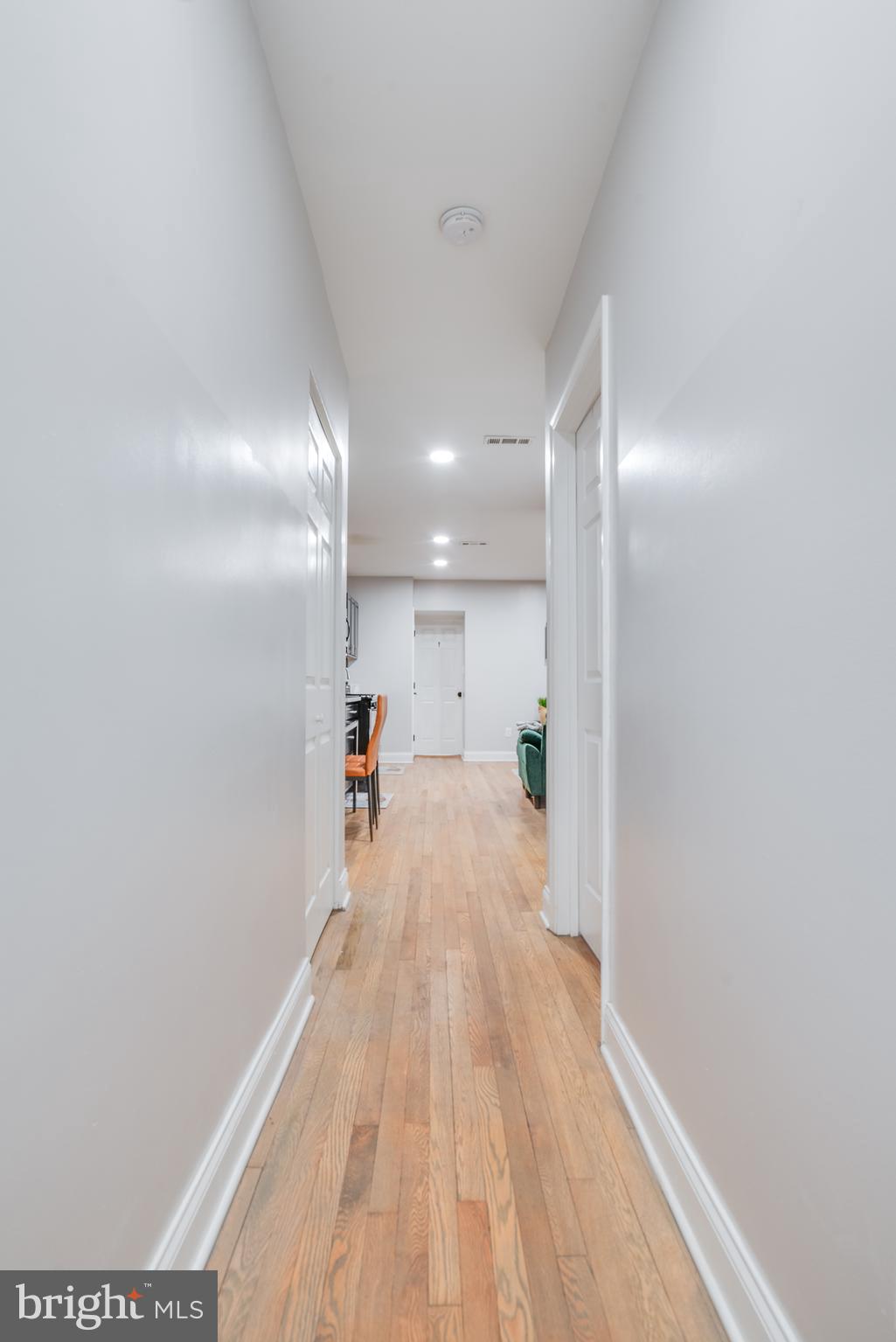 1255 Raum Street Northeast, Unit 1 Washington, DC 20002 - Photo 24 of 31 a view of empty room with wooden floor