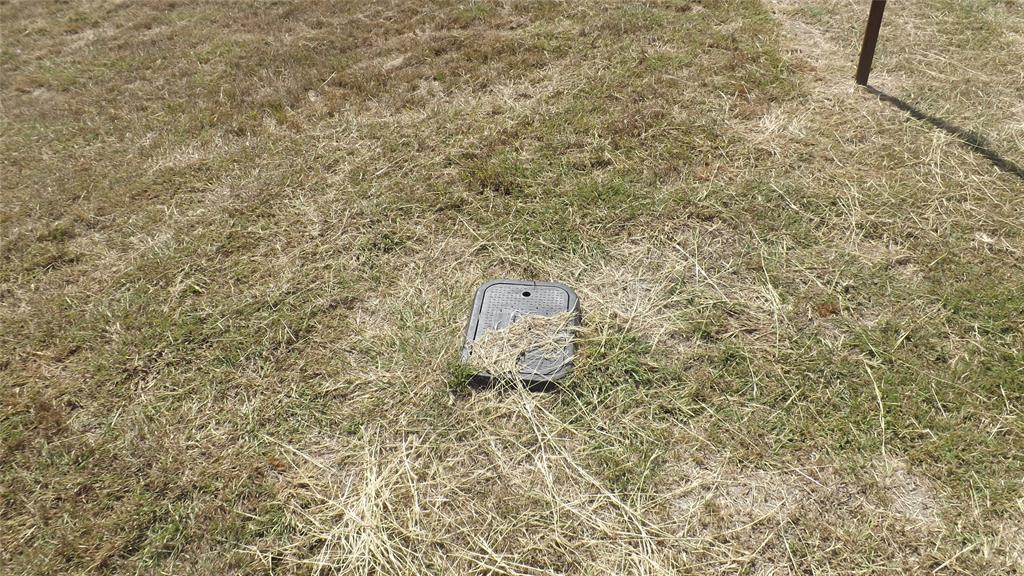 Tbd Eason Road Ennis, TX 75119 - Photo 3 of 10 a close up of a wall with a shower