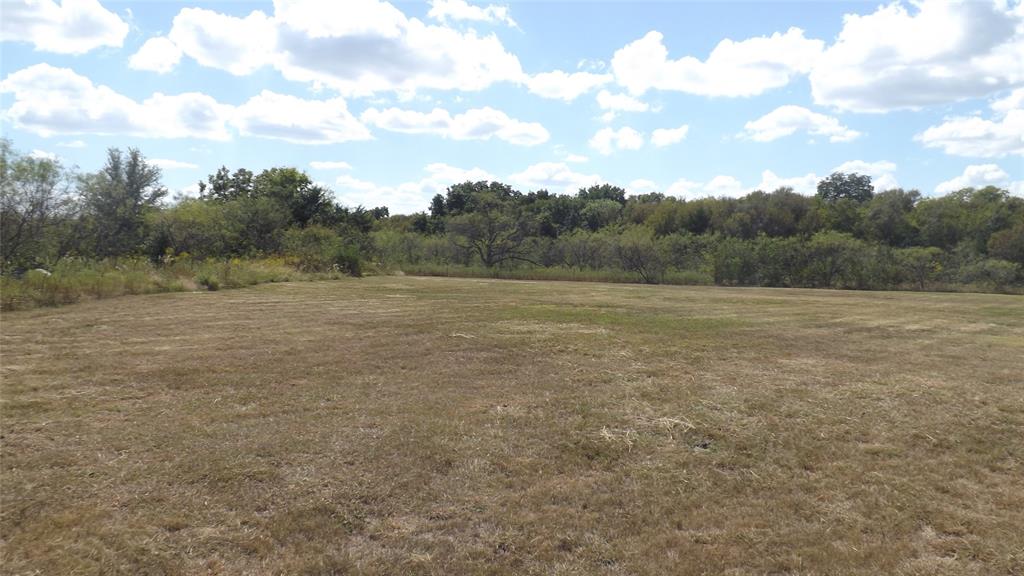 Tbd Eason Road Ennis, TX 75119 - Photo 8 of 10 a view of outdoor space with field and trees around