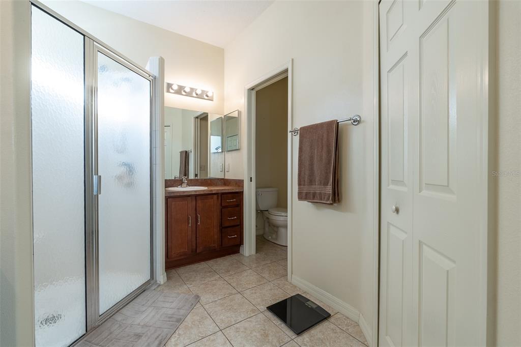15803 Southwest 11th Court Road Ocala, FL 34473 - Photo 24 of 59 a bathroom with a shower and a sink