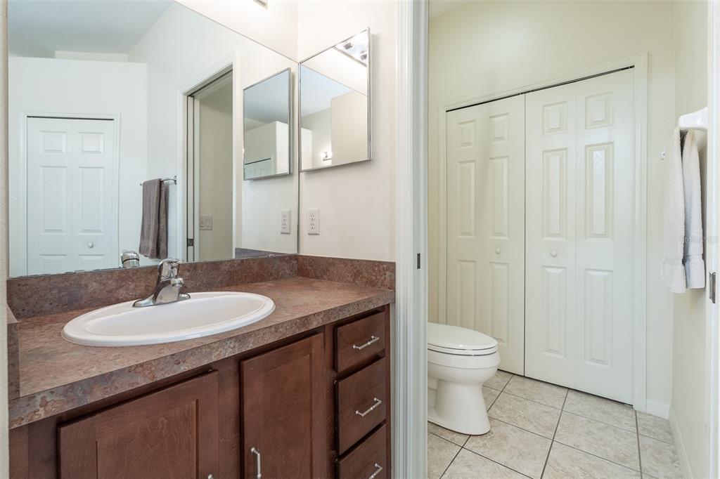 15803 Southwest 11th Court Road Ocala, FL 34473 - Photo 25 of 59 a bathroom with a sink and a toilet