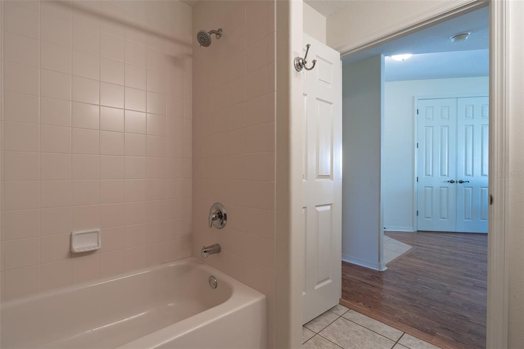 15803 Southwest 11th Court Road Ocala, FL 34473 - Photo 37 of 59 a bathroom with a bathtub and shower