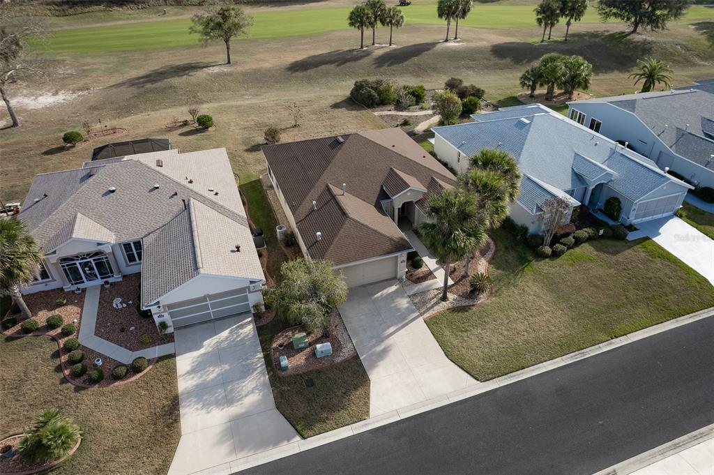 15803 Southwest 11th Court Road Ocala, FL 34473 - Photo 55 of 59 an aerial view of residential houses with outdoor space and parking