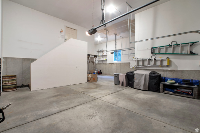 577 South Ridge Top Lane East North Salt Lake, UT 84054 - Photo 38 of 57 Rare oversized garage with exceptional ceiling height and extensive storage potential.