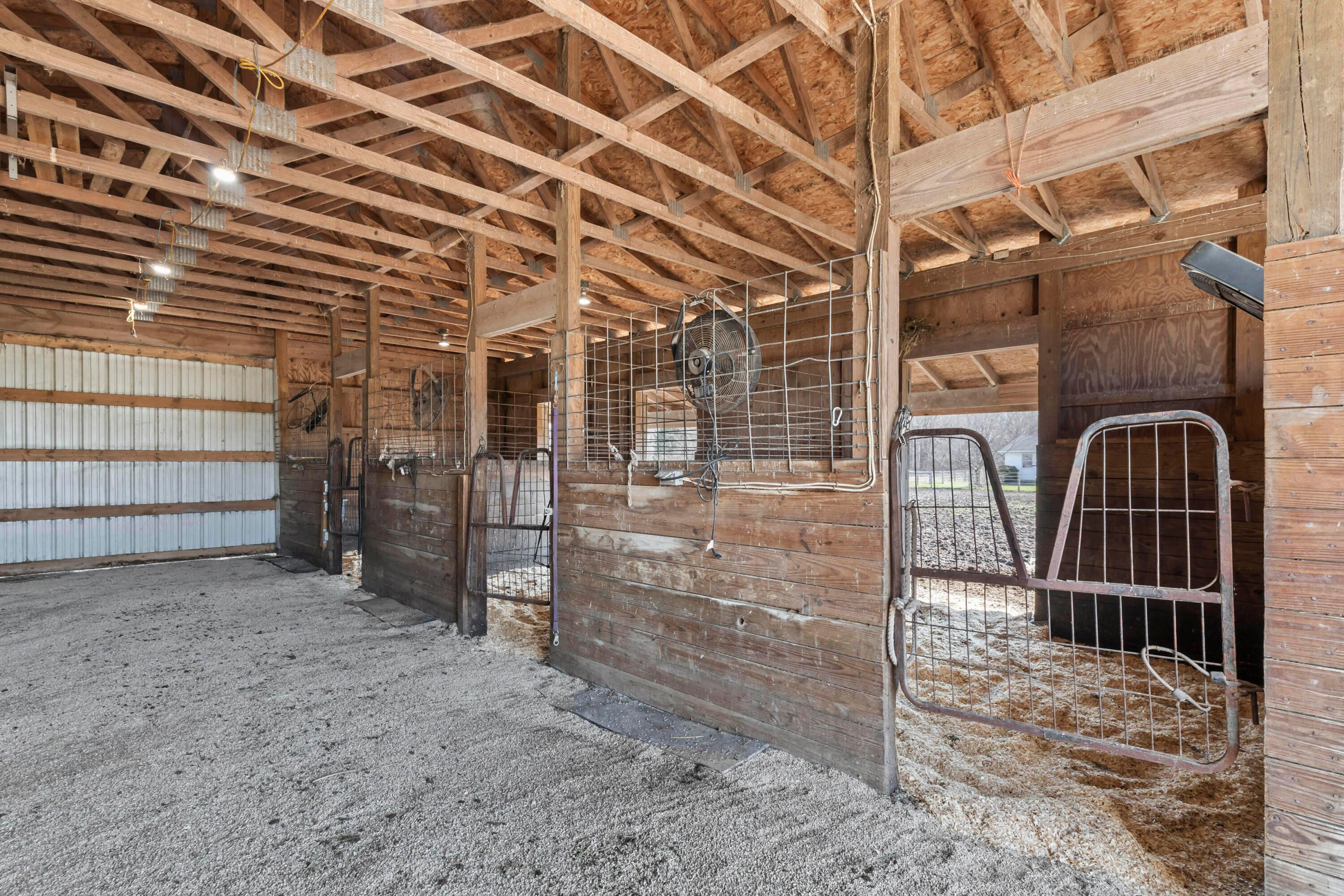 14040 Downing Road Croton, OH 43013 - Photo 50 of 66 • Aluminum exterior
• (3) stalls matted
• Man door
• (3) stalls with openings
to lean - to
• Water spigot
• Tack area