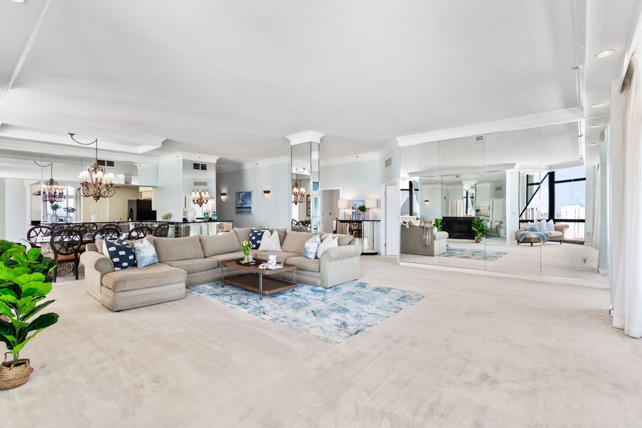 950 Highway 98, Unit 7101 Destin, FL 32541 - Photo 11 of 74 a living room with furniture and a dining table with kitchen view