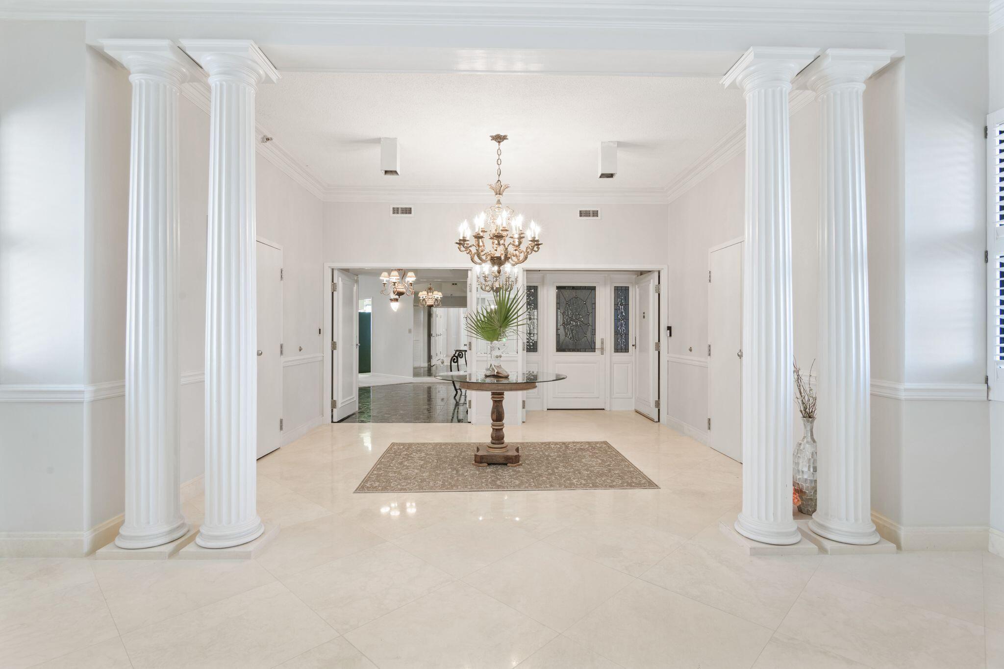 950 Highway 98, Unit 7101 Destin, FL 32541 - Photo 12 of 74 a living room with furniture and a chandelier