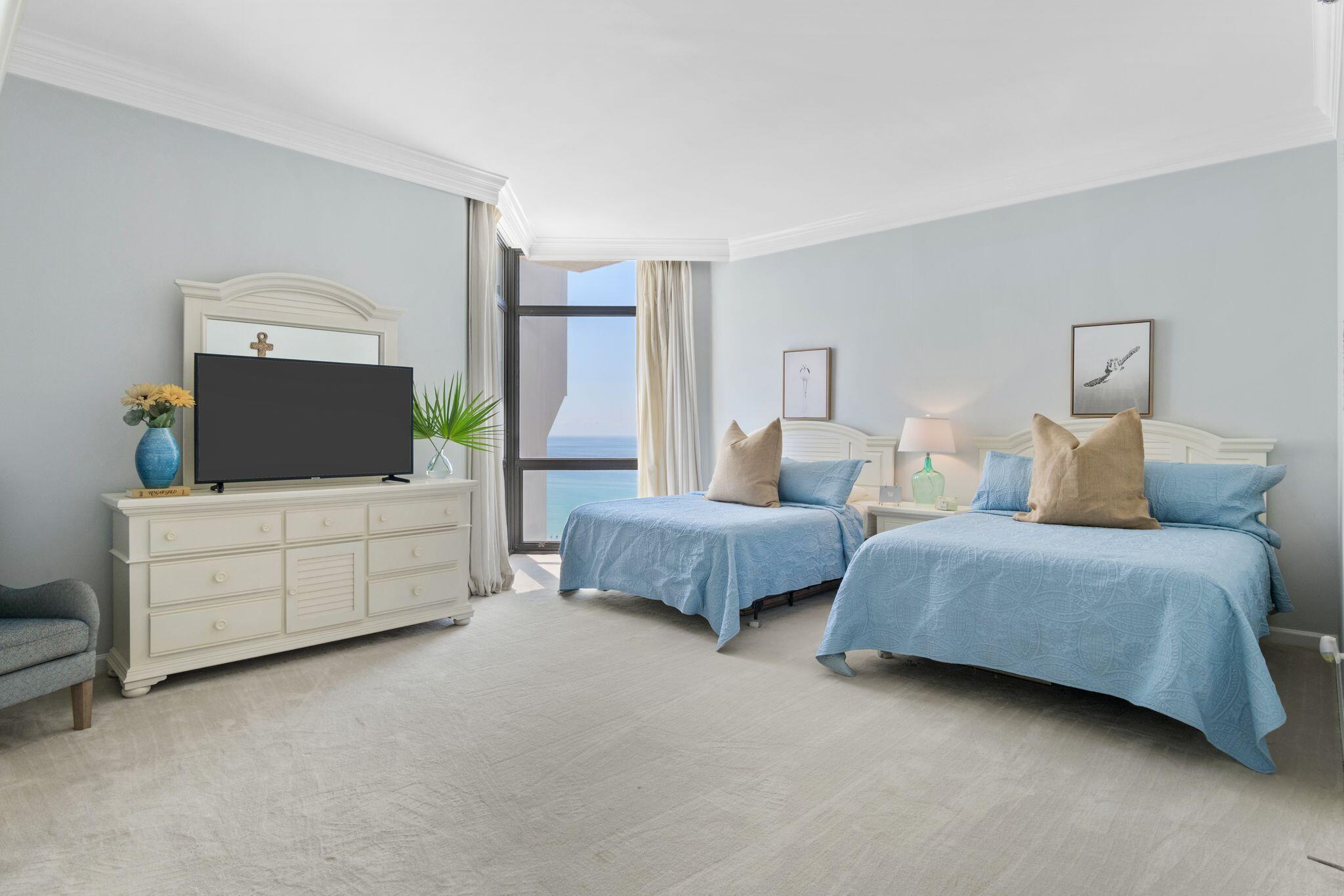 950 Highway 98, Unit 7101 Destin, FL 32541 - Photo 15 of 74 a bedroom with bed and window