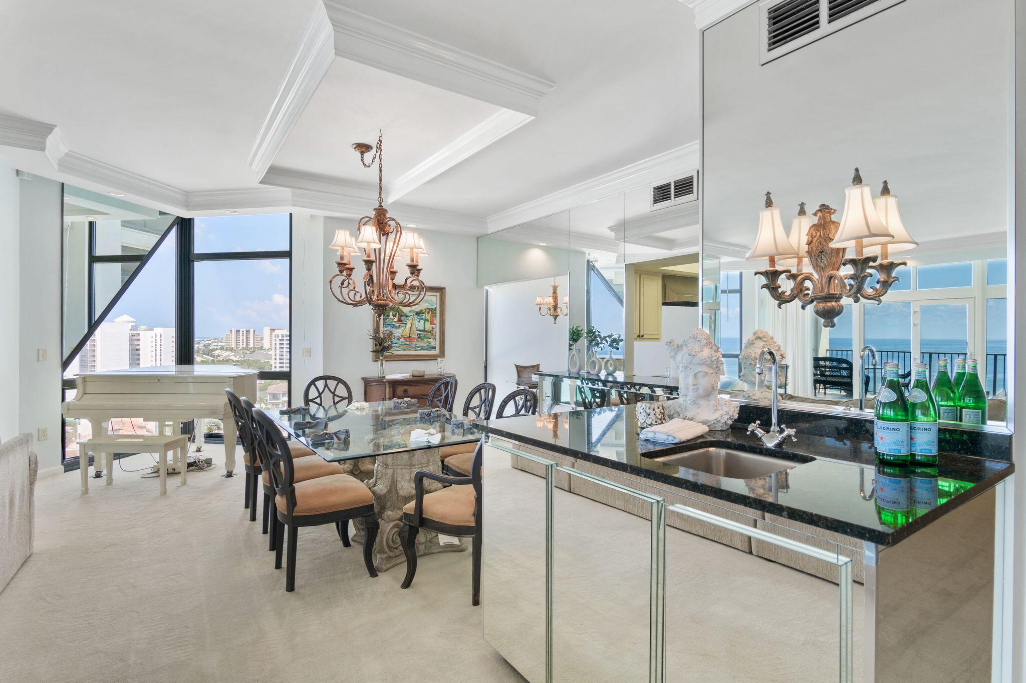 950 Highway 98, Unit 7101 Destin, FL 32541 - Photo 29 of 74 a very nice looking dining room with a large dining table and chairs