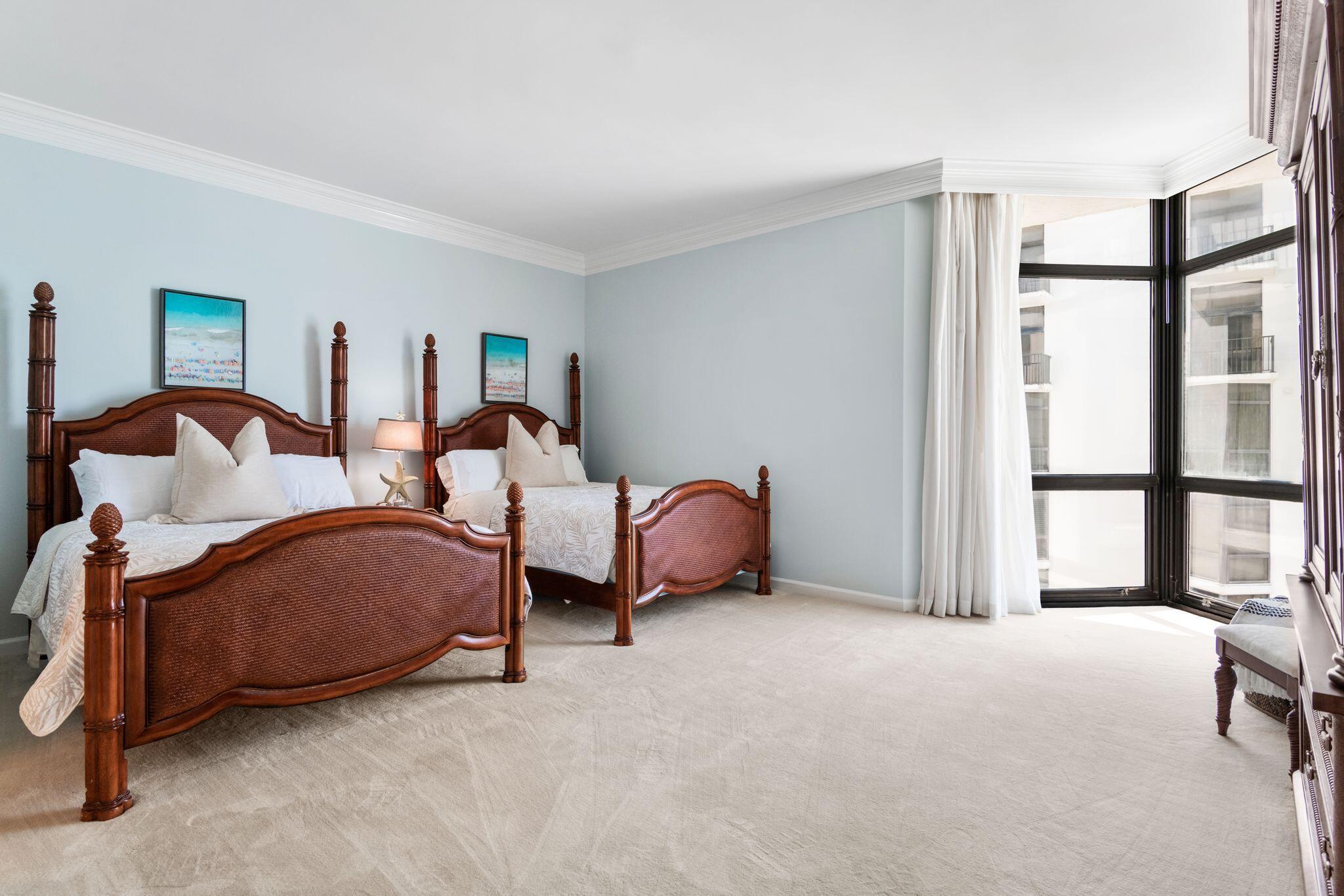 950 Highway 98, Unit 7101 Destin, FL 32541 - Photo 37 of 74 a bedroom with bed and a large window