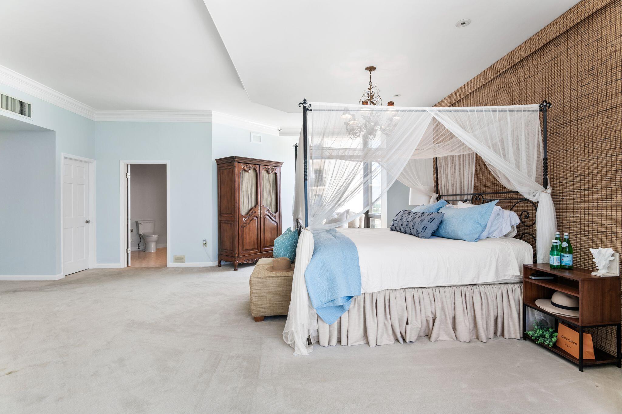 950 Highway 98, Unit 7101 Destin, FL 32541 - Photo 46 of 74 a bedroom with furniture and a large window