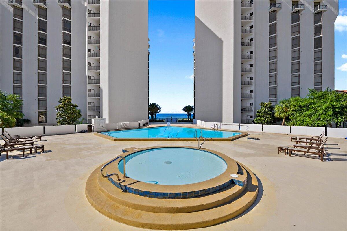 950 Highway 98, Unit 7101 Destin, FL 32541 - Photo 58 of 74 a view of swimming pool with outdoor seating