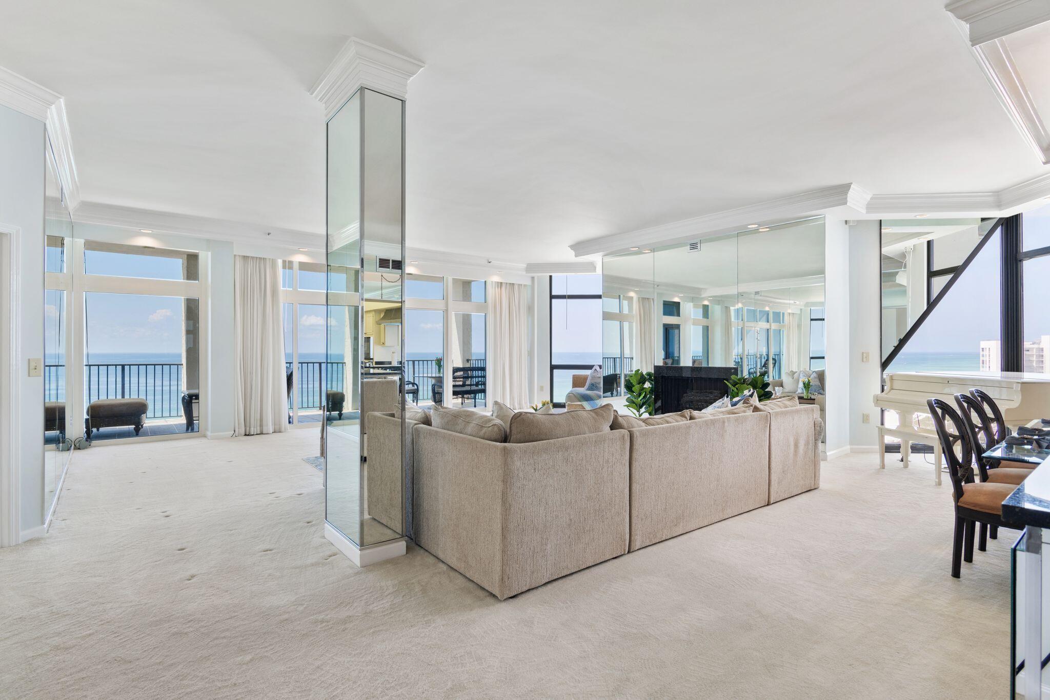 950 Highway 98, Unit 7101 Destin, FL 32541 - Photo 6 of 74 a living room with furniture and a chandelier