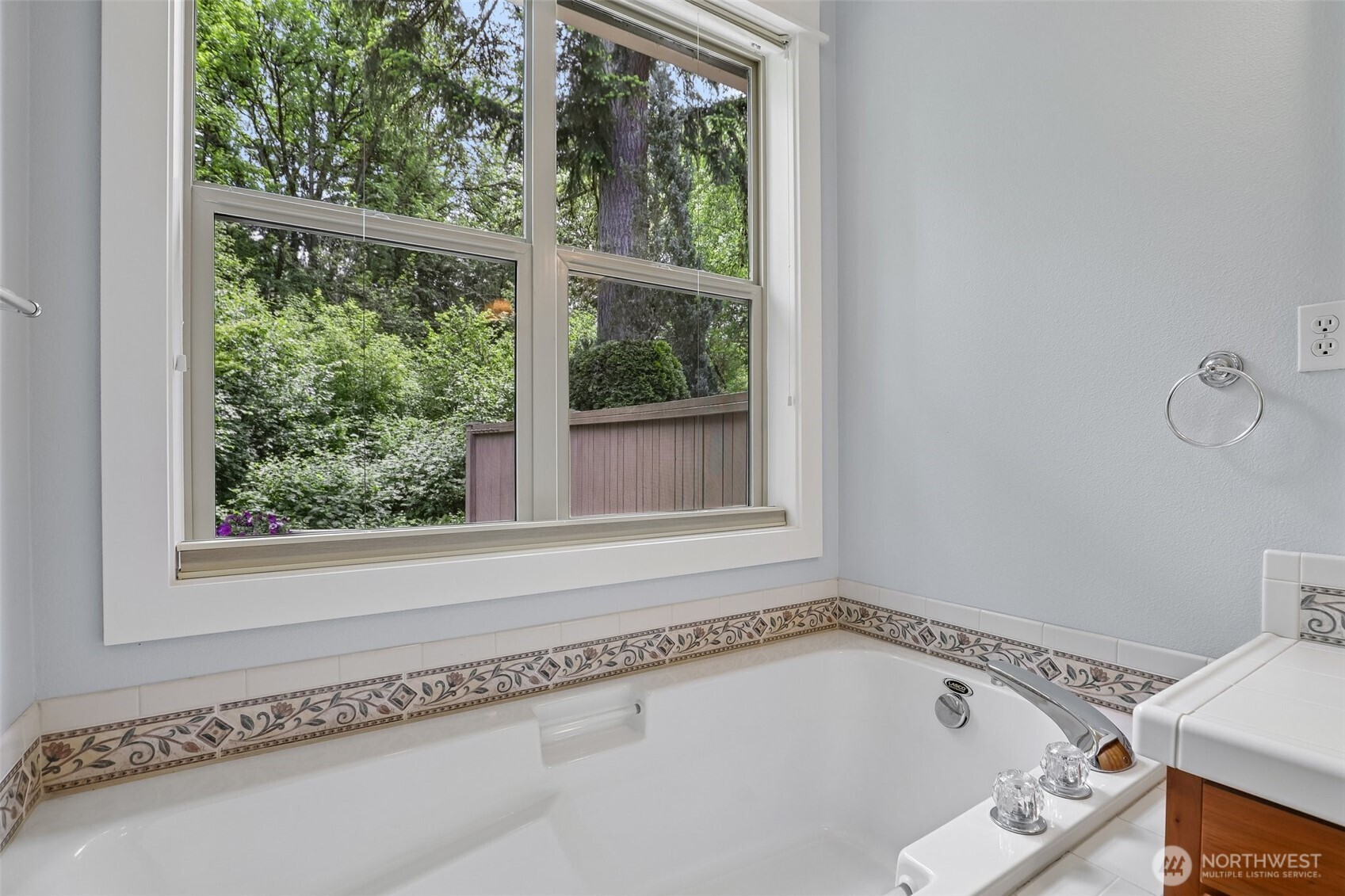 19709 Southeast 26th Way Camas, WA 98607 - Photo 26 of 36 a bathroom with a bathtub and a window