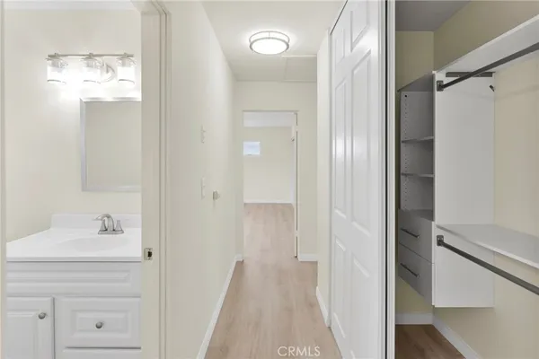 a view of an empty room with a fireplace