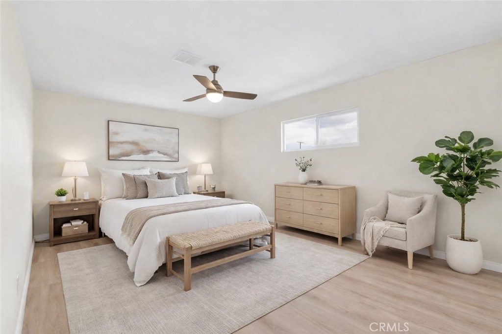 47424 Paddington Landers, CA 92285 - Photo 19 of 67 a bed room with a bed and a chair