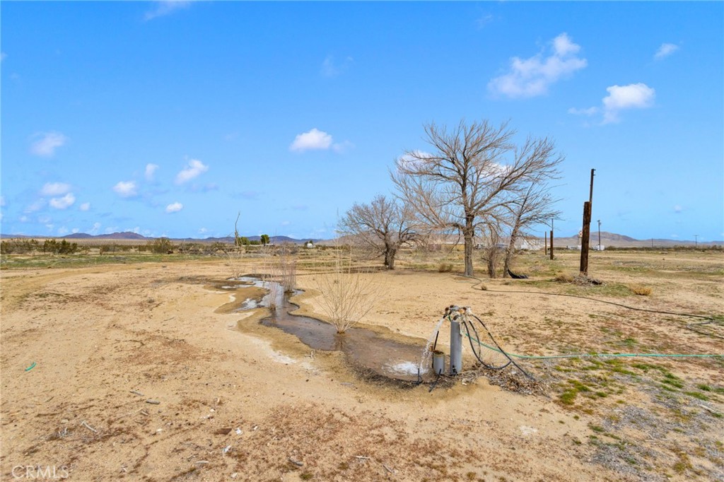 47424 Paddington Landers, CA 92285 - Photo 40 of 67 a view of a lake with a yard