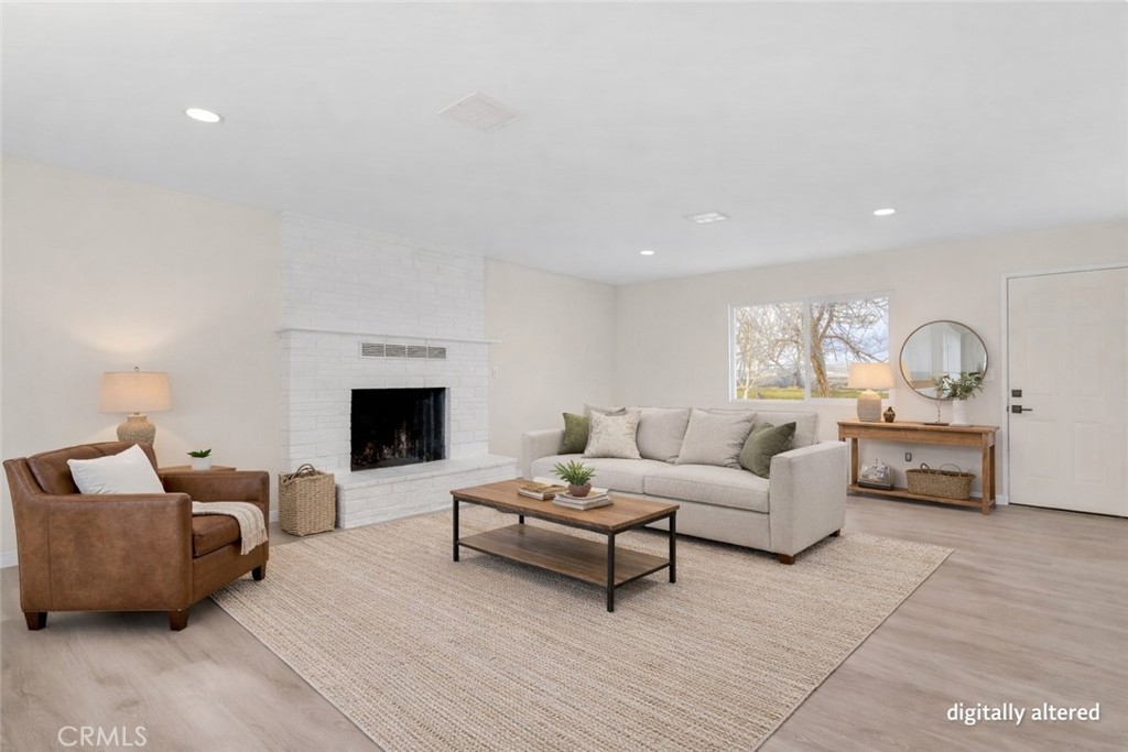 47424 Paddington Landers, CA 92285 - Photo 10 of 67 a living room with furniture and a fireplace