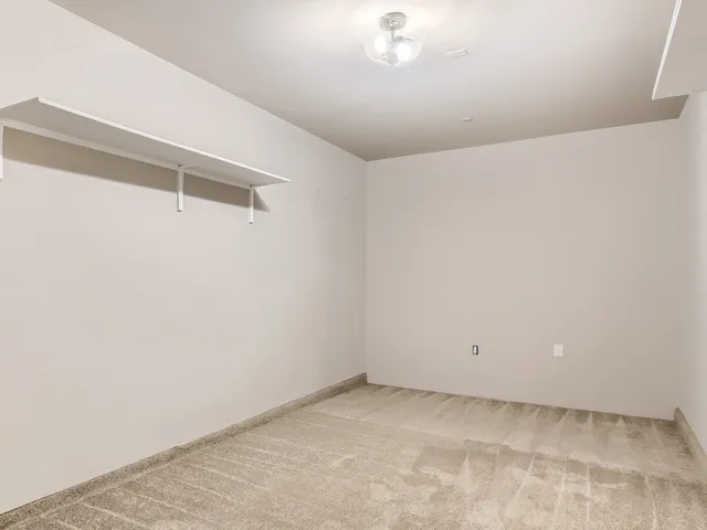 a view of a room with racks on the wall