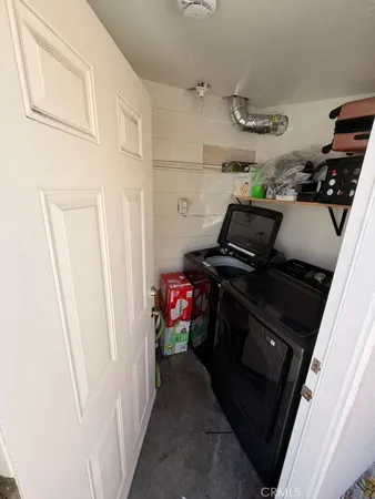 a view of storage and utility room