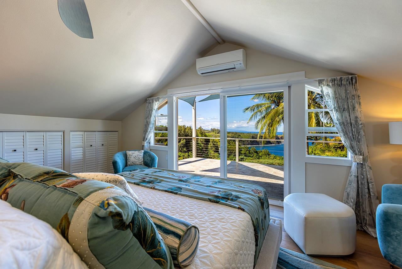 555 North Holokai Road Haiku, HI 96708 - Photo 23 of 50 The primary suite's private deck overlooks Ua’oa Bay from a unique vantage point
