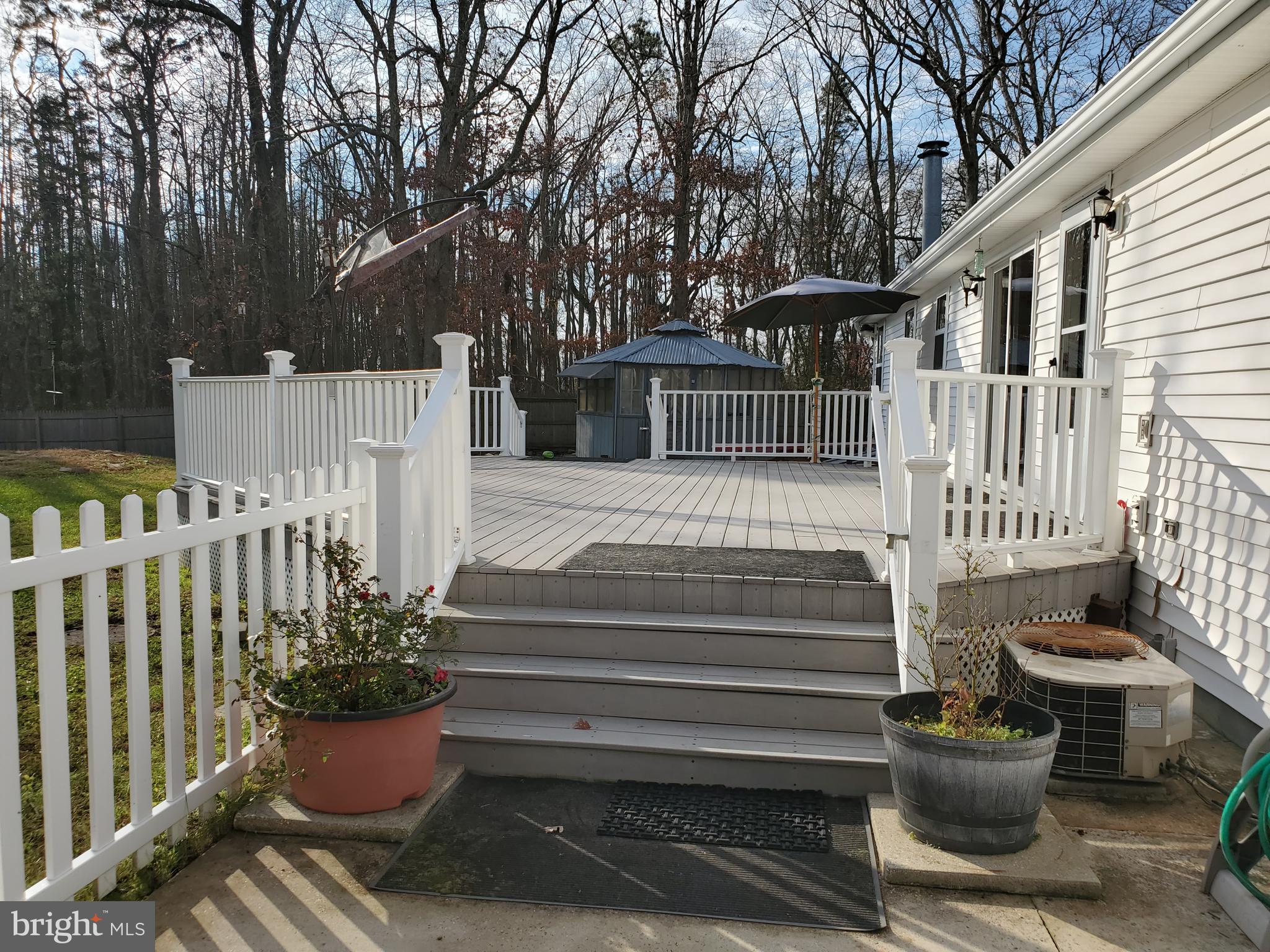 406 Spring Road Hammonton, NJ 08037 - Photo 4 of 22 deck from driveway