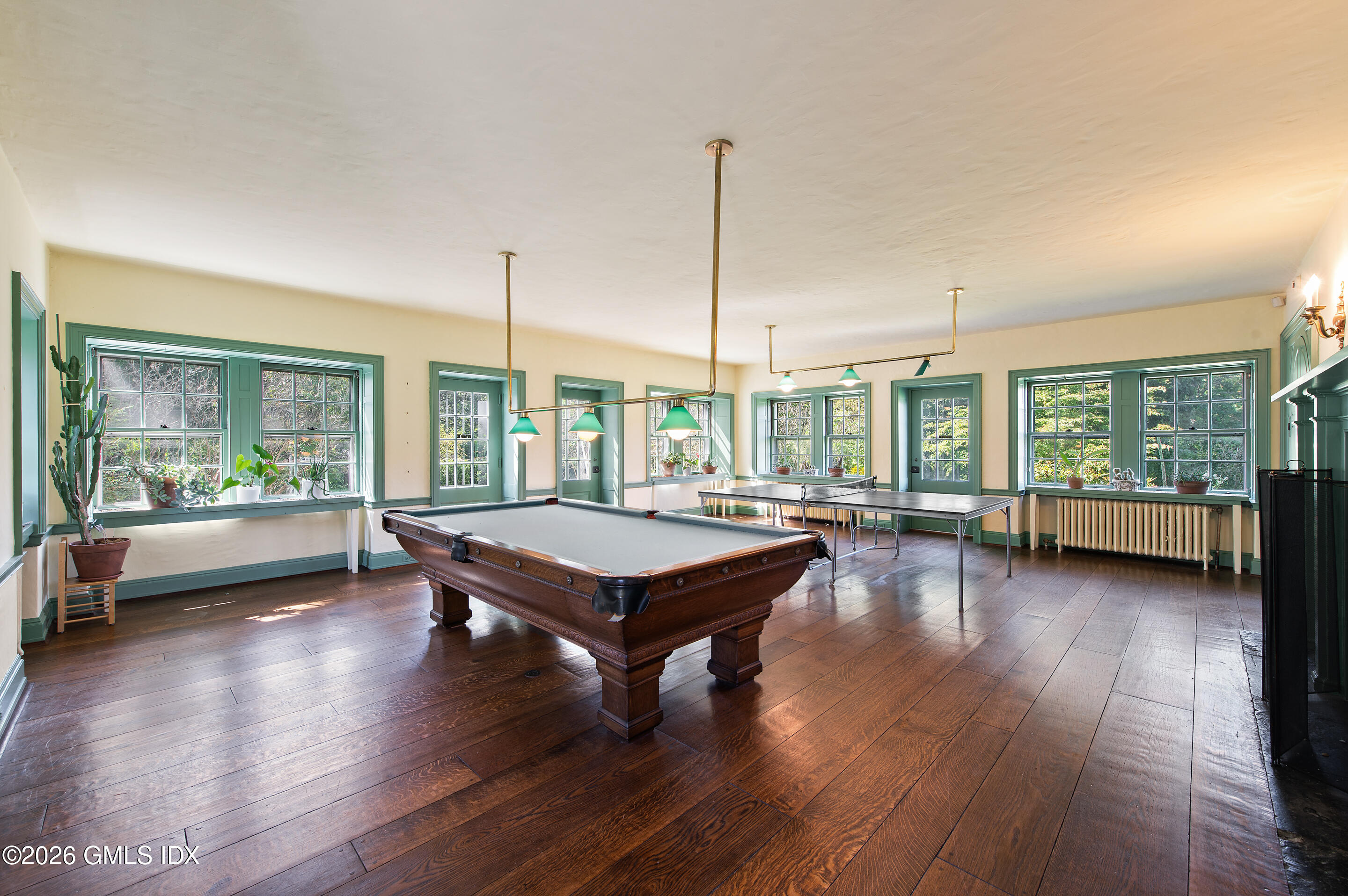 122 Round Hill Road Greenwich, CT 06831 - Photo 8 of 37 a room with pool table and glass door
